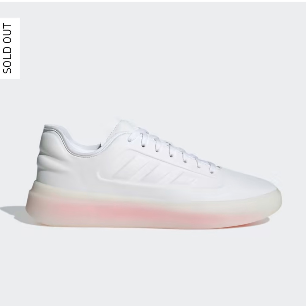 adidas White Athletic Sneakers with Subtle Pink Sole